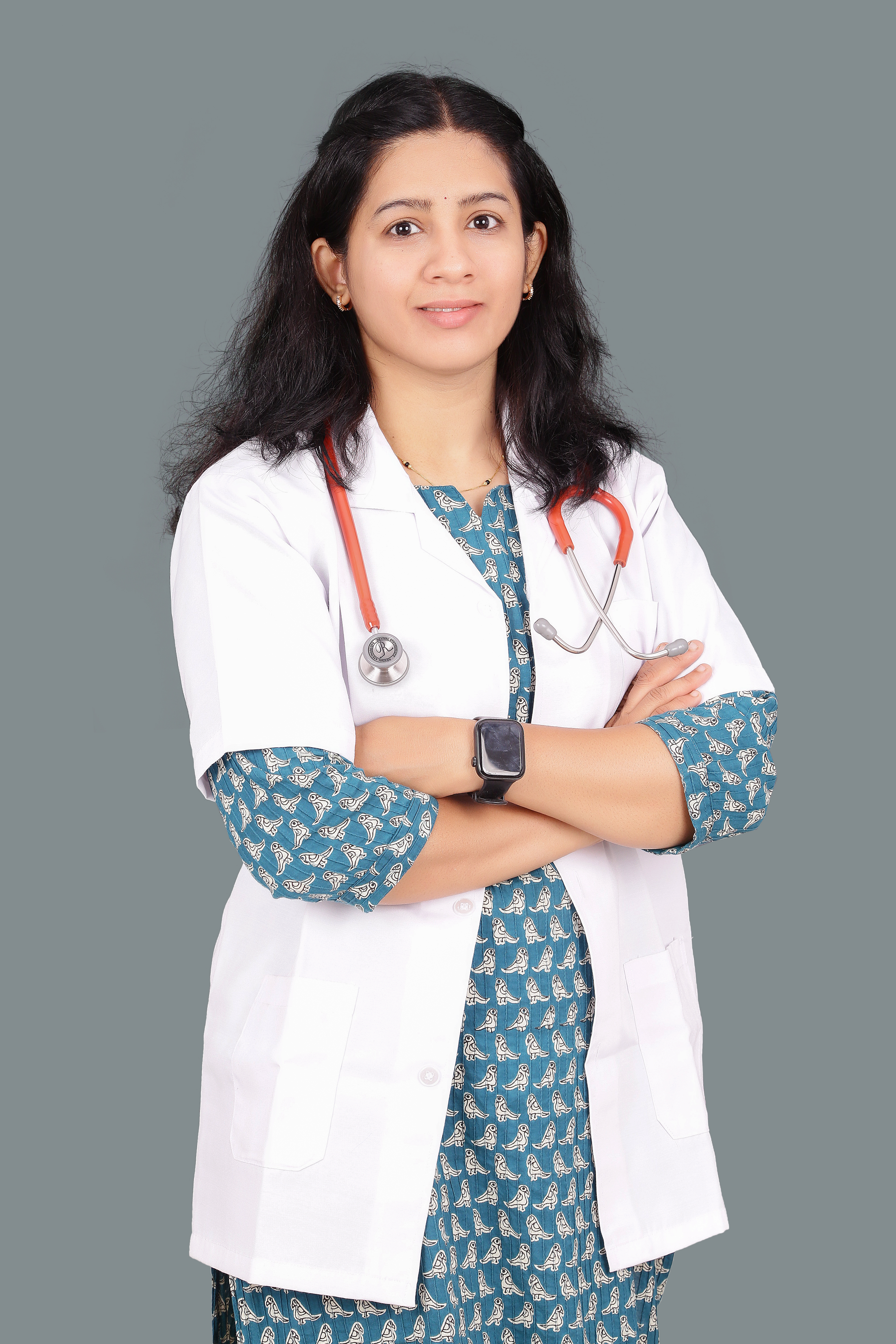 Dr. Archana Khujat Kalyani in her clinic coat