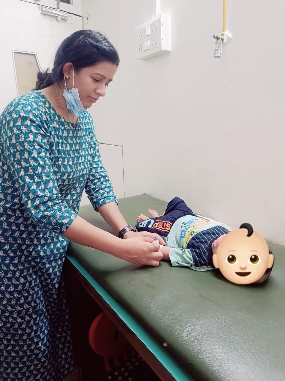 Dr. Archana providing child care