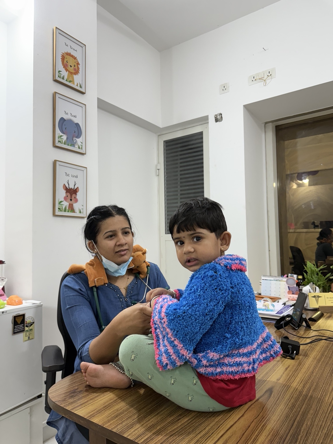 Dr. Archana with a young patient